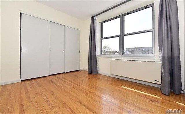 Building Photo - 41-02 Queens Blvd