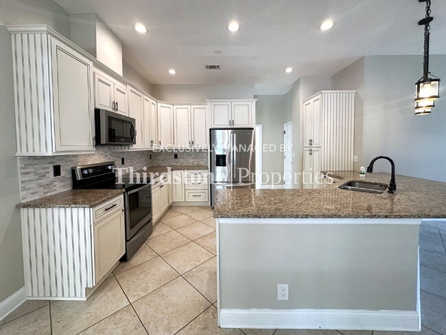 Building Photo - 12770 Camellia Bay Dr W