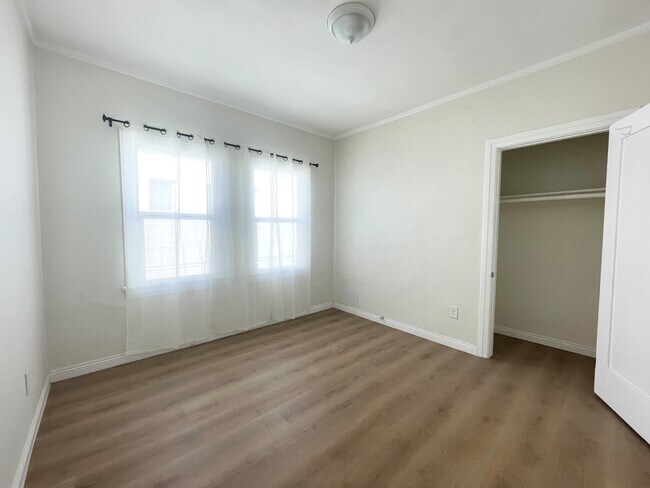 Bedroom 1 w/new dual paned windows - 518 N Spaulding Ave