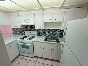 Building Photo - 1300 W 47th Pl