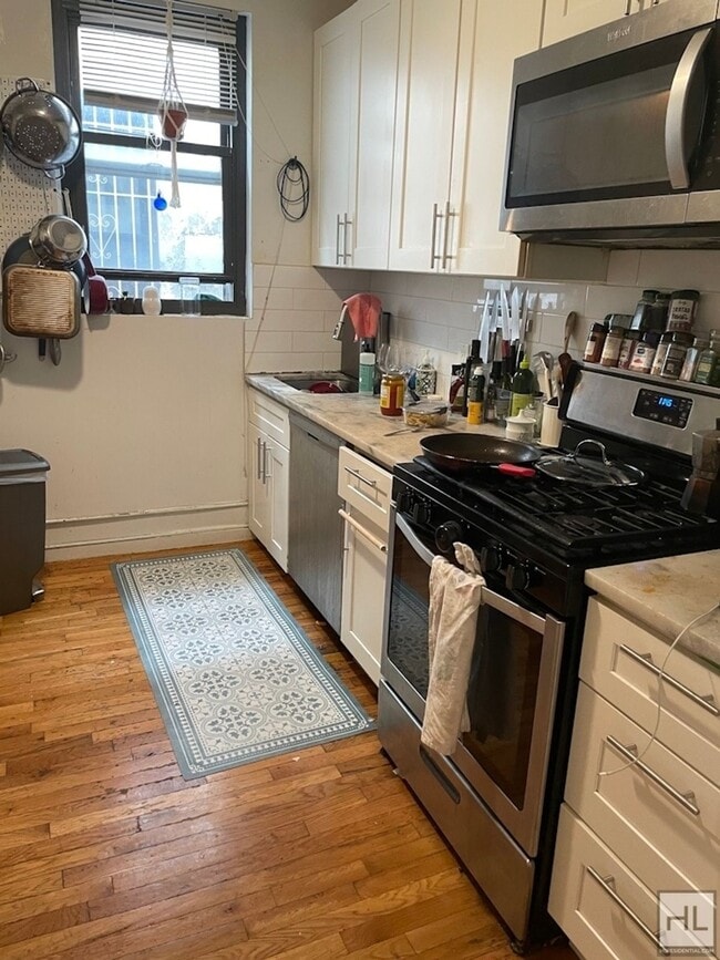 Building Photo - SULLIVAN PLACE / Renovated Full-Floor 1-Be...