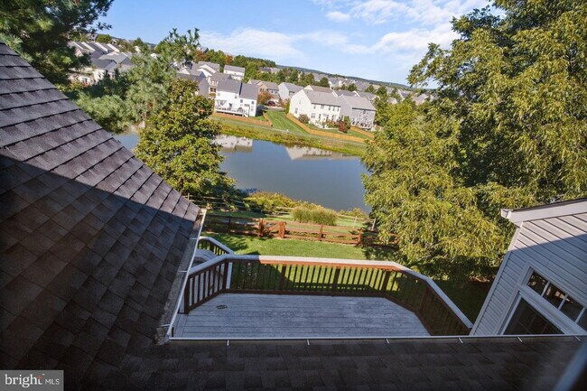 Building Photo - Spacious 4-Bedroom Home with Lake Views & Finished Basement