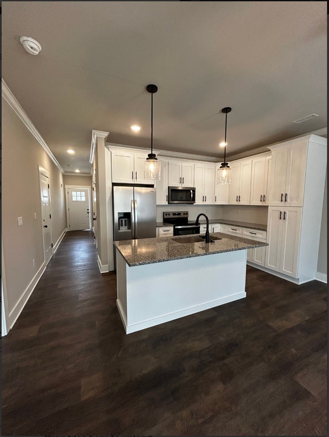 Building Photo - BRAND NEW Charming 2 Bed, 2 Bath, 1 Car Garage Townhome!