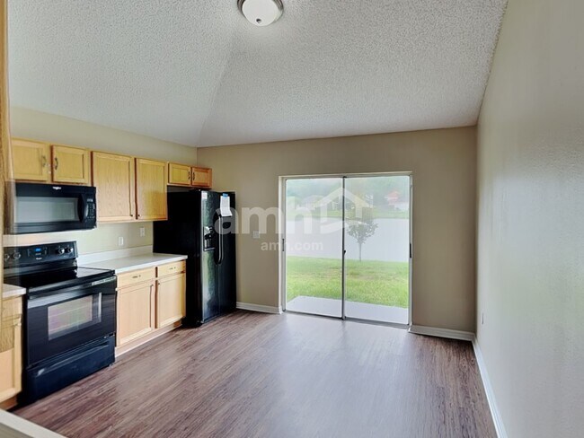 Foto del edificio - 6606 Gentle Oaks Dr N