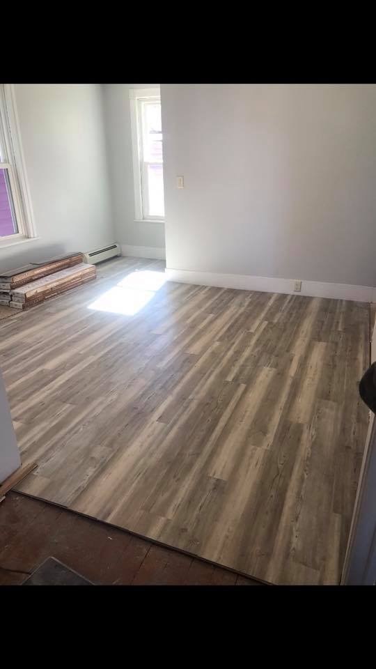 New laminate flooring in the Dining room - 13 W Milford st