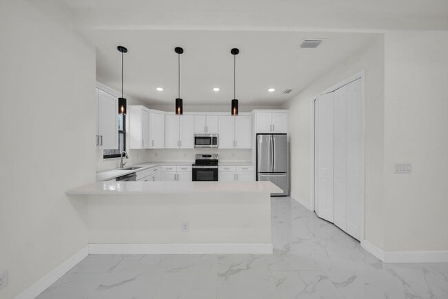 Building Photo - Be the first in occupy this 2026 constructed home in the city of Port Charlotte FL! Qualify for a...