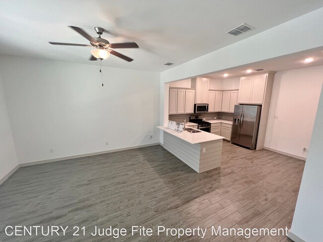 Building Photo - 3 br, 2.5 bath House - 6565 Iron Horse Bou...