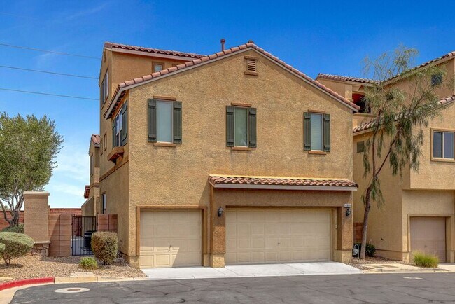 Building Photo - 6998 Castle Mountain Avenue