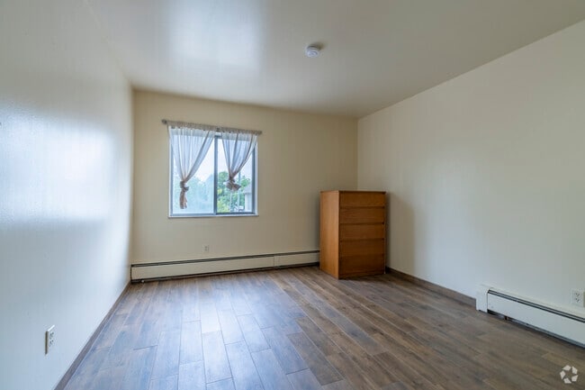 1BR, 1BA - 700SF - Corner Balcony - Bedroom - 323 Packard St