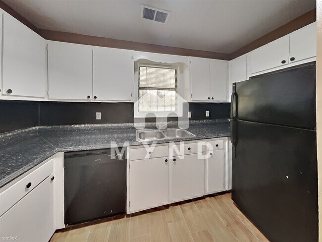 Foto del edificio - 2 br, 2.5 bath House - 5624 Windwood Rd