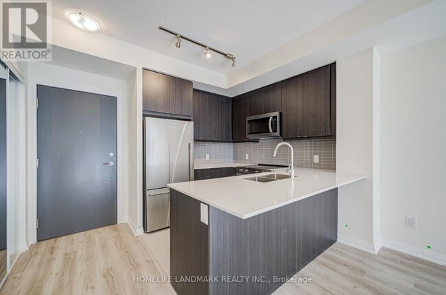 Building Photo - 3260 Sheppard Ave E