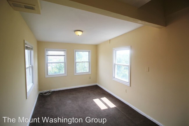Building Photo - 305 S Stricker St