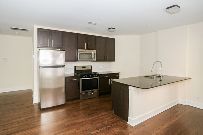 Foto del edificio - 5054 N Winchester Ave