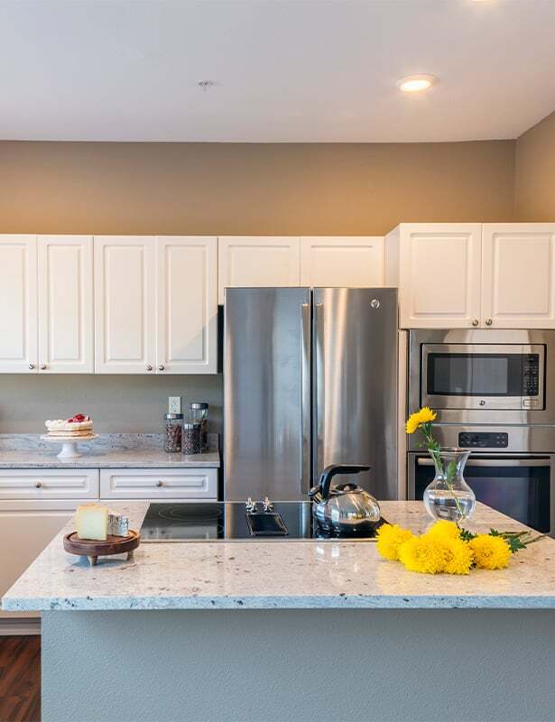 Kitchens feature custom touches like kitchen islands and breakfast bars - Boulder Creek