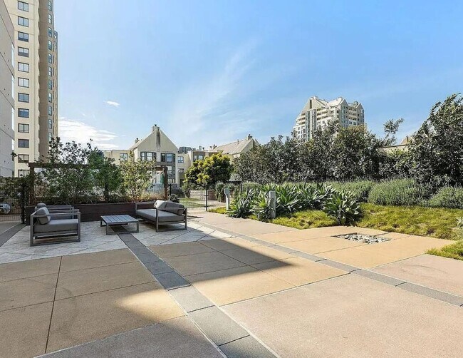 Building Photo - Corner Light. City Energy. Zero Compromise.