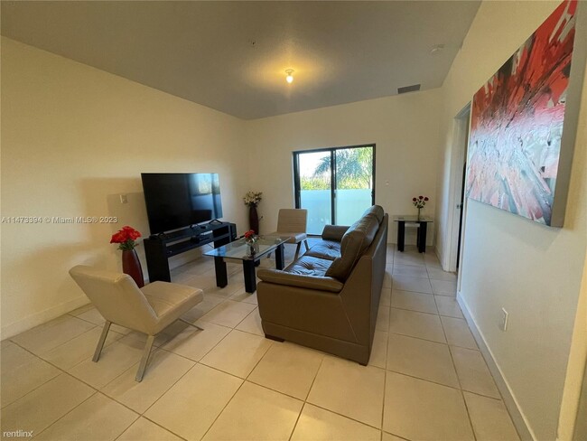 Foto del edificio - 3 br, 2 bath House - 8031 NW 104th Ave Apt 26