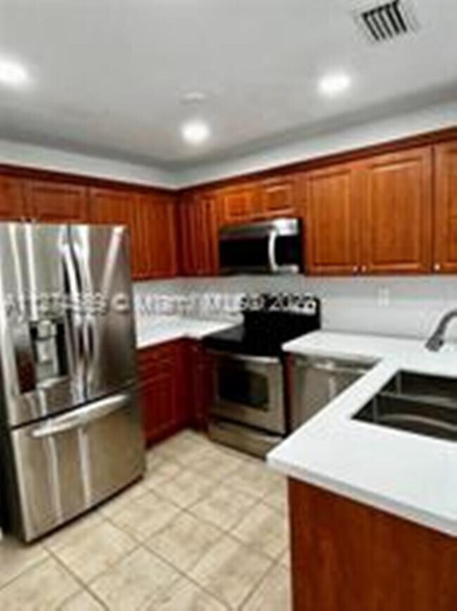 Photo - 10584 SW 6th St Townhome