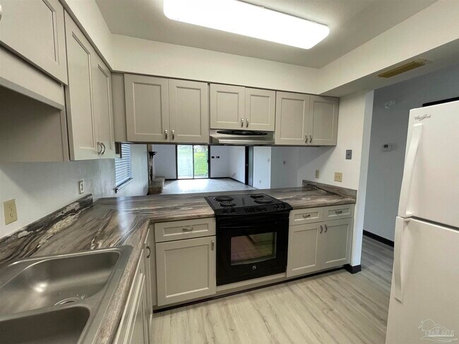 Foto del edificio - 9928 Fairway Villas Ln