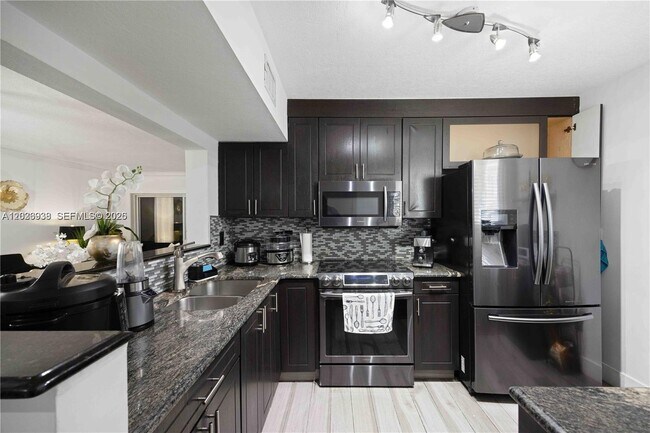 Building Photo - Northwest 11th Lane, Miami, FL 33182 - 3 BR 2 BA condo