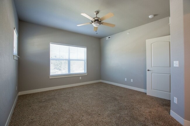 Building Photo - 5233 Boardwalk Drive B203