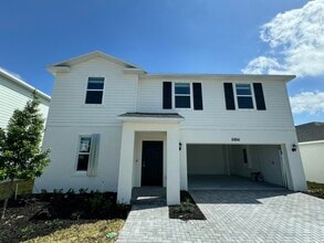 Building Photo - 10856 NW Everbreeze Dr