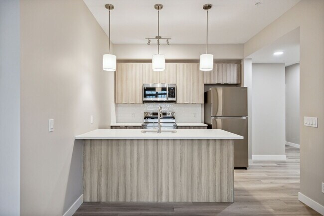 Photo du bâtiment - Discover Your Dream Home at Riverpark Apar...