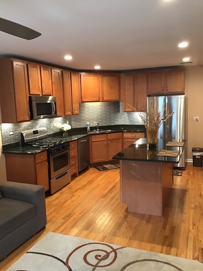 Foto del edificio - 4629 S Langley Ave