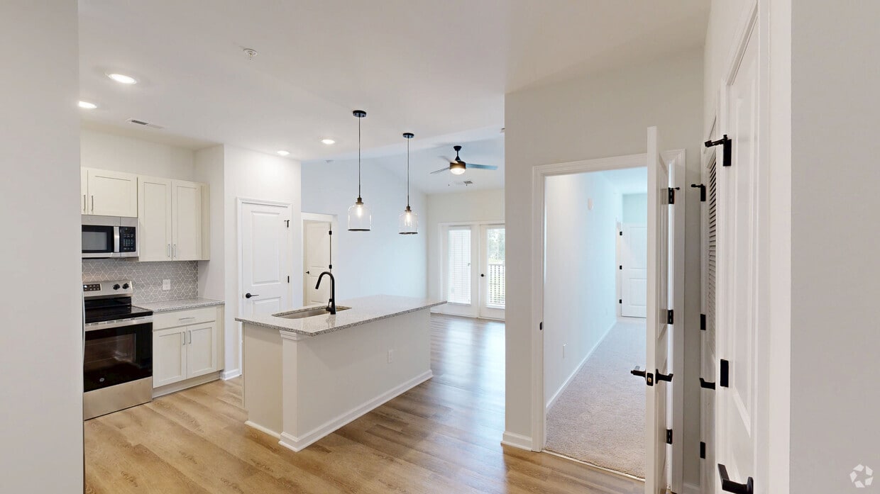 Photo - Evolve at the Pines Apartments