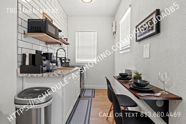Building Photo - Chic Urban Living: Your Studio Oasis in Yb...
