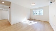 This contemporary 940 square foot apartment in Redwood City offers a harmonious blend of style and functionality. The single-floor layout encompasses three bedrooms and two bathrooms, with the primary bedroom boasting a spacious 130 square feet. The heart of the home is an open-concept living area that seamlessly integrates the kitchen and living room, promoting a sense of spaciousness and fluidity.

The kitchen is a testament to modern design, featuring sleek wooden cabinetry, stainless steel appliances, and ample counter space. Throughout the apartment, light-toned hardwood flooring creates a bright, airy atmosphere, complemented by crisp white walls and recessed lighting. Large windows in the bedrooms and living areas flood the space with natural light, while also offering views of the surrounding urban landscape.

Both bathrooms are thoughtfully designed with modern fixtures, including a combination tub-shower in one and a vanity with abundant storage. The apartment's climate control is ensured by wall-mounted air conditioning units, providing year-round comfort. With its clean lines, neutral color palette, and contemporary finishes, this apartment embodies urban sophistication and practical living in the heart of Redwood City.