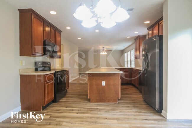 Foto del edificio - 8124 Grassy Meadow Ln