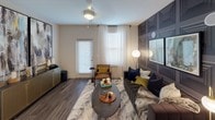 Located at 14244 Brown Grier Rd in Charlotte, NC, this thoughtfully designed single-floor residence blends contemporary finishes with bold, curated interior styling throughout. The living area makes an immediate impression with wood-look flooring, large windows dressed in sheer curtains, a ceiling fan, and a dramatic dark wall panel feature that adds depth and sophistication to the space. The kitchen is well-appointed with crisp white cabinetry, granite countertops, a full suite of stainless steel appliances including a side-by-side refrigerator with ice and water dispenser, a built-in microwave, and a dedicated wine rack — all complemented by a tile backsplash and ample storage. The primary bedroom offers a serene retreat with richly textured wallpaper, plush carpeting, and carefully layered décor. Additional bedrooms feature accent walls, ceiling fans, and generous natural light from multiple windows. Both bathrooms are finished with granite-topped white vanities, wood-look flooring, and shower-tub combinations. One bathroom includes direct access to a walk-in closet, enhancing functionality. Throughout the residence, design-forward details and cohesive styling create a polished and comfortable living environment.