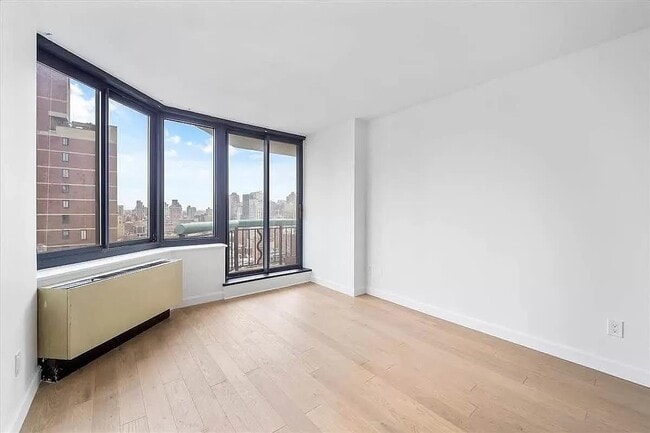 Building Photo - 303 E 60th St