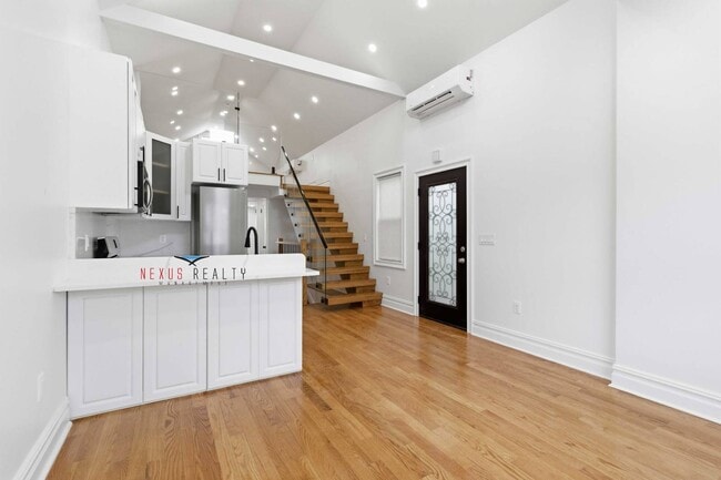 Building Photo - 21-28-28 48th St