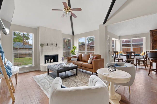 Living room-Dark out blinds not pictured, 65"smart4K TV, curated furnishings and art - 4330 Saint Francis Ave