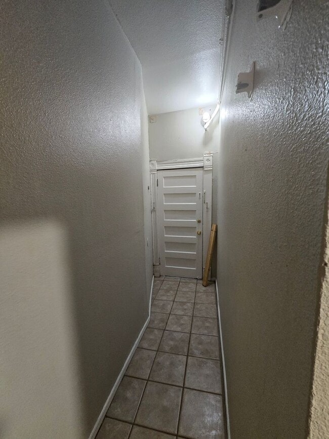 Building Photo - This updated and welcoming condo in the he...
