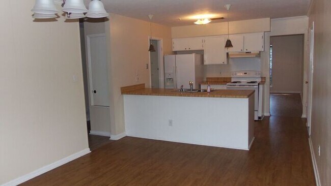 Building Photo - 3+bedrooms 2baths With Carport Available N...