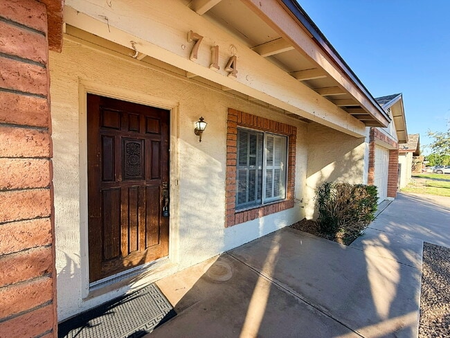 Building Photo - "Charming 3-Bedroom Oasis in Goodyear - Sp...