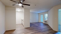 Located at Alma Ave in Walnut Creek, CA, this thoughtfully designed one-bedroom, one-bathroom residence offers a functional and comfortable layout across a single floor. The open-concept living and dining area serves as the heart of the home, featuring warm hardwood-style flooring, a ceiling fan, and windows that invite generous natural light while offering views of the surrounding greenery. The well-equipped galley kitchen is positioned just off the living area and includes stainless steel appliances — a refrigerator, range, microwave, and dishwasher — paired with white cabinetry and light-toned countertops, creating a clean and efficient workspace. A pass-through opening connects the kitchen to the main living space, enhancing the open feel. The bedroom is a comfortably sized retreat finished with plush carpeting, a sliding-door closet, and windows that bring in natural light. An additional closet provides extra storage. The bathroom features a full tub and shower combination enclosed by sliding glass doors with chrome hardware. A hallway connects the rooms efficiently, and the unit includes two closets for ample storage. The neutral color palette and consistent finishes throughout give the space a cohesive, move-in-ready appeal.