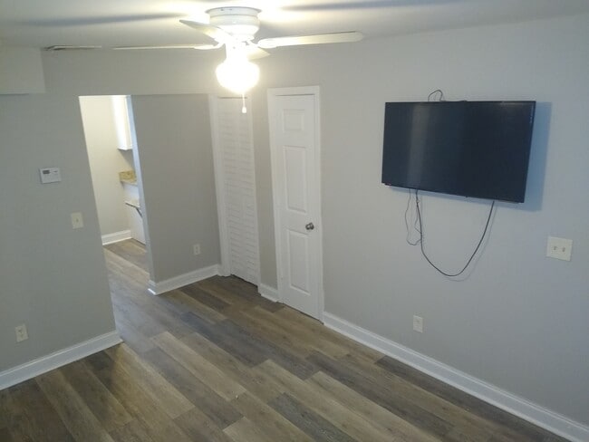 Living-room with TV - 710 North Ave NW