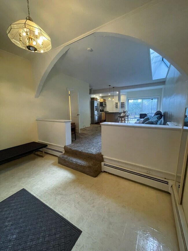 Foto del edificio - One Block to the Diag! Charming Home with Private Courtyard + Parking