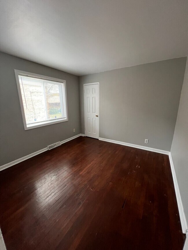 Building Photo - This recently updated raised brick-ranch h...
