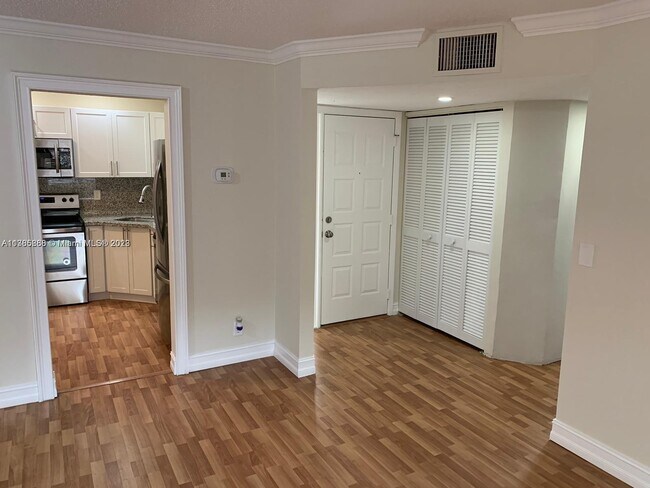 Building Photo - 3775 Cocoplum Cir