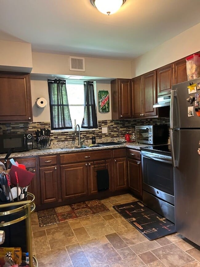 Photo - Adorable 2BR 1.5BA w/ Attached Garage • Yard in Roselawn House