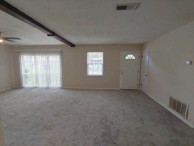 Building Photo - Nicely updated 3BR/1.5BA with fenced in ba...