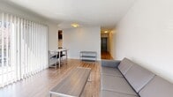 Located at 1155 Marine St in Boulder, CO, this efficient one-bedroom, one-bathroom unit offers a thoughtfully organized single-floor layout. The living room is bright and welcoming, featuring light hardwood-style flooring, neutral white walls, and a window that invites natural light. It flows naturally toward a compact dining area and adjoining kitchen with dark cabinetry and tile backsplash details. A private balcony extends the living space outdoors, ideal for enjoying Boulder's surroundings. The hallways connecting each room are clean and well-lit, maintaining a cohesive, uncluttered feel throughout. The bedroom is a comfortable, carpeted retreat with a large double-door closet, a window with natural light, and a textured accent wall. An additional closet provides further storage convenience. The bathroom features a dark-cabineted vanity with a white countertop, a large mirror, and wood-style flooring for a modern touch. In-unit laundry adds everyday practicality to this well-rounded space. With its clean design, functional room arrangement, and desirable Boulder address, this unit delivers a streamlined living experience.