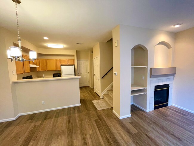 Dining area off kitchen, gas fireplace - 5555 E Briarwood Ave