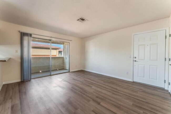 Building Photo - This beautifully renovated 2-bedroom, 2-bath condo is ready for immediate move-in!