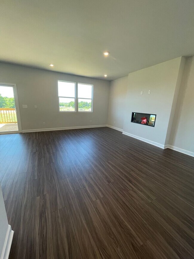 Building Photo - Introducing a stunning home