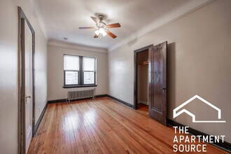 Building Photo - 948 W Cuyler Ave